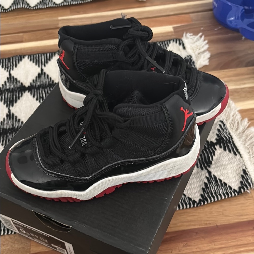 Jordan 11 Retro Low PS - Black and Red